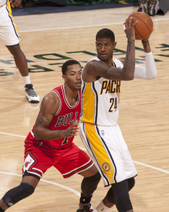 Chicago's Derrick Rose guards Indiana's Paul George. The Pacers beat the Bulls 97-80 on Wednesday night. Photo by Frank McGrath, Pacers Sports and Entertainment.